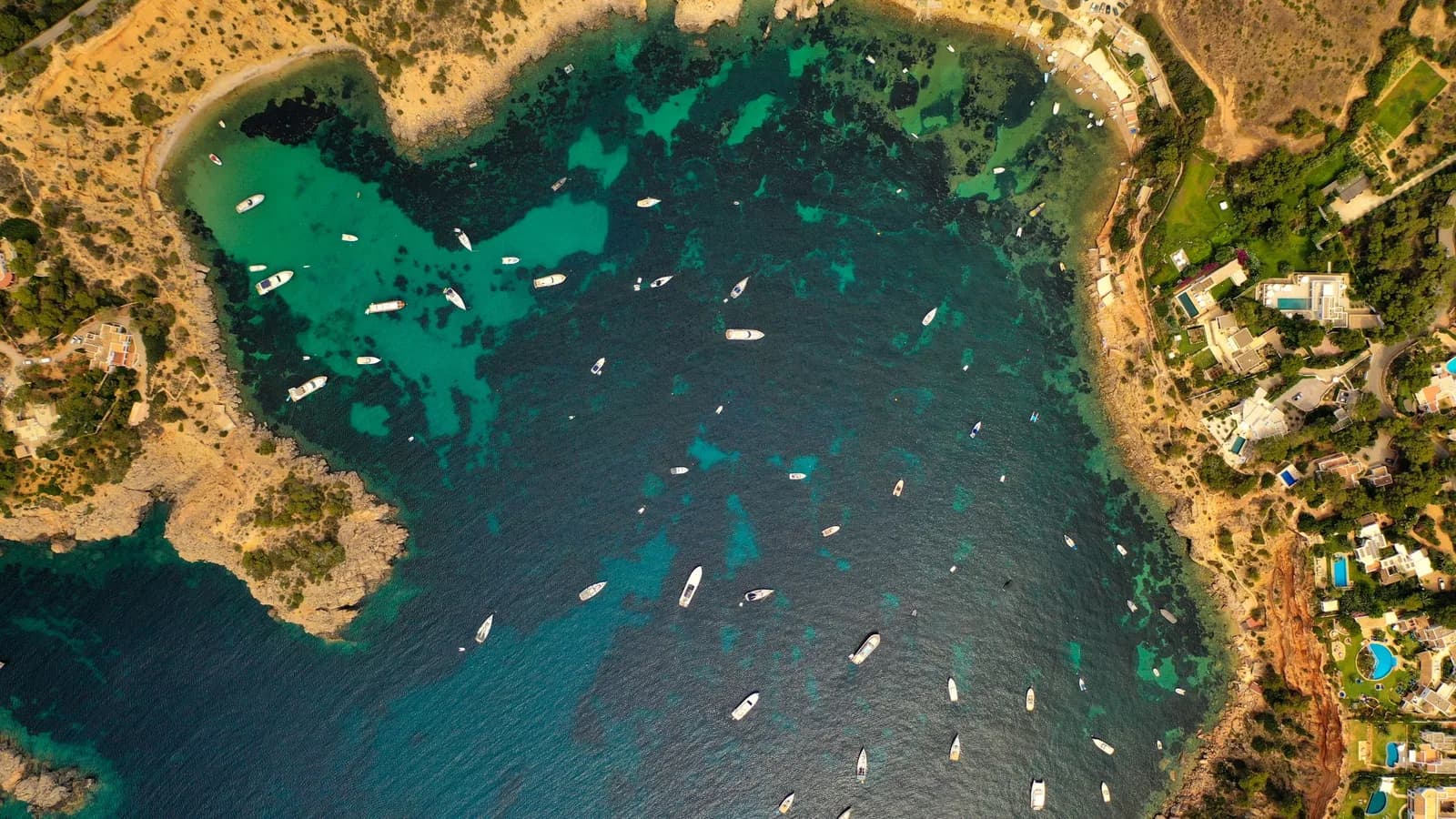 Aerial view of boats along the Ibiza coast