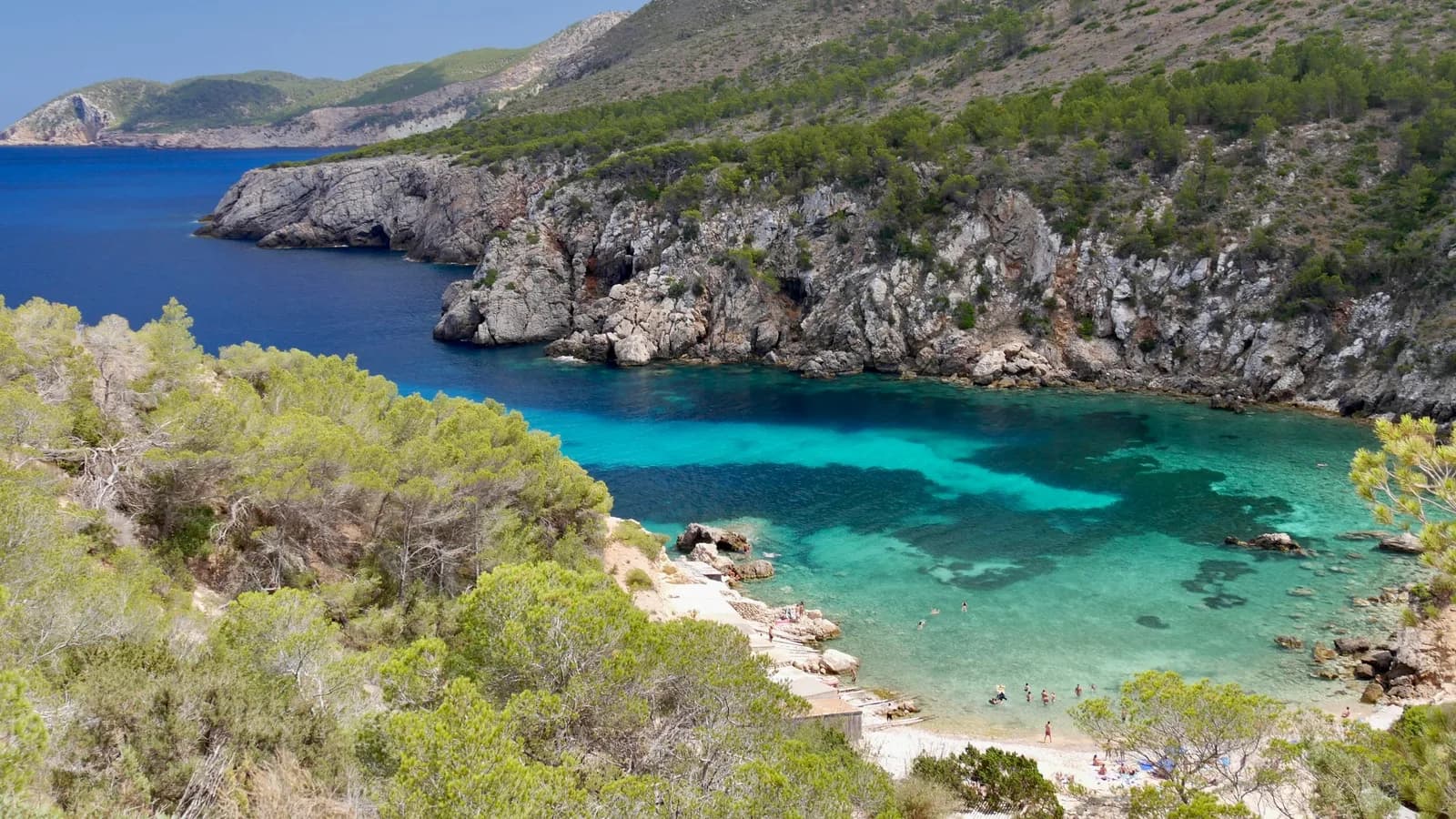 A rocky cove with turquoise water on Ibiza
