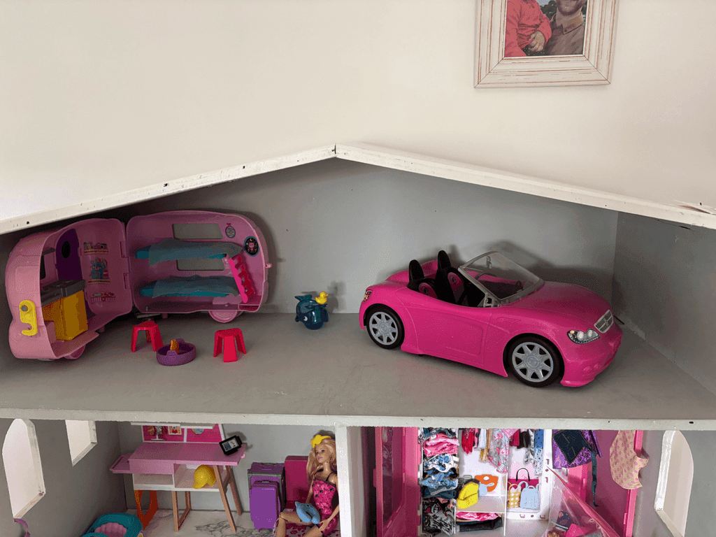 Barbie house with Barbies and accessories